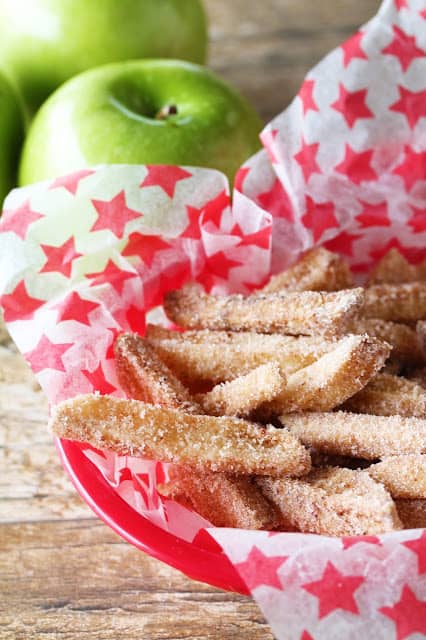 Apple fries sprinkled with sugar in a basket