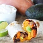 Burritos filled with black beans, avocado, the sweetness of sweet potatoes complimented with the smokiness of chipotle peppers and melted cheese