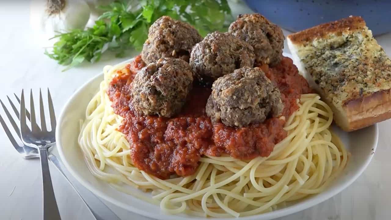 Spaghetti and Meatballs in a white dish