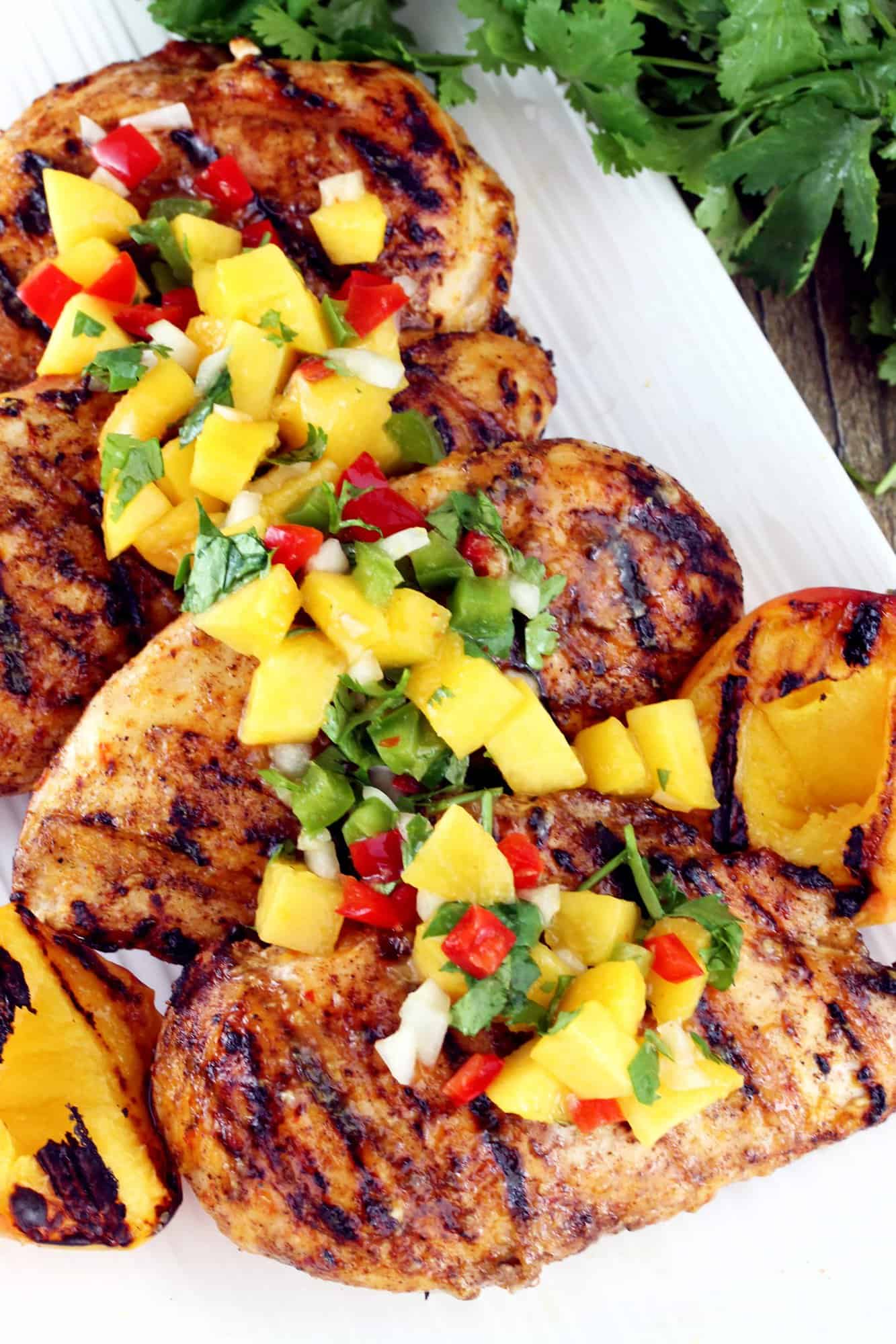  Chicken is grilled to perfection with a spicy peach glaze and then topped off with a fres Chipotle-Peach Glazed Grilled Chicken Breast