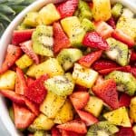 Bird's eye view of Summer Fruit Salad in a white bowl.