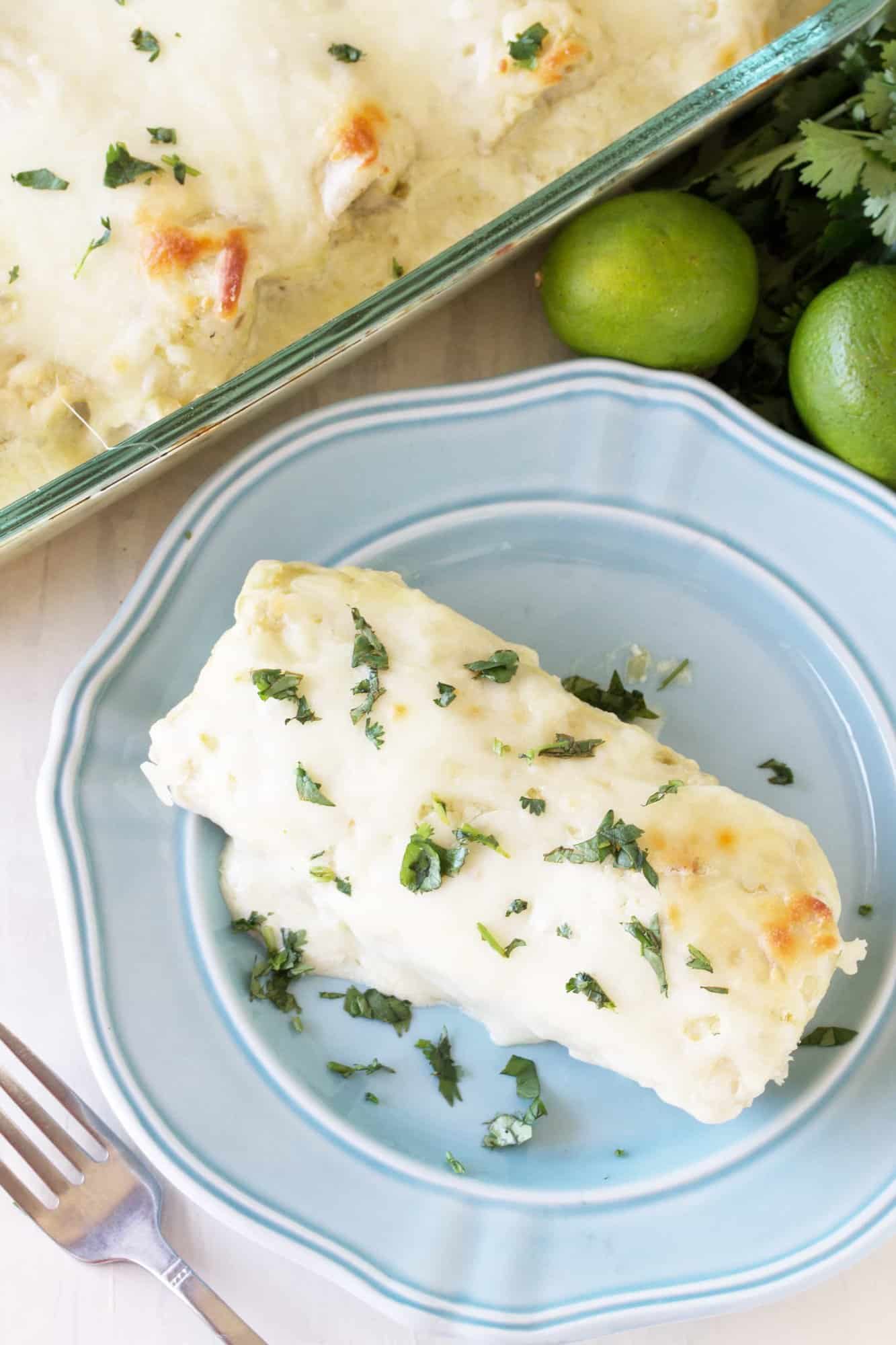 These easy to put together Green Chile Cream Cheese Enchiladas are a classic American family favorite. This version is quick to put together using fresh ingredients.