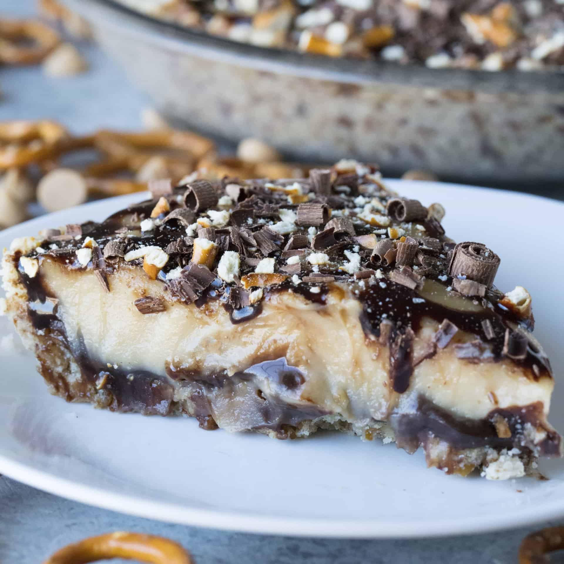 Get ready for a pie that will change your life! Peanut Butter Hot Fudge Pie with Pretzel Crust is sure to be a family favorite!