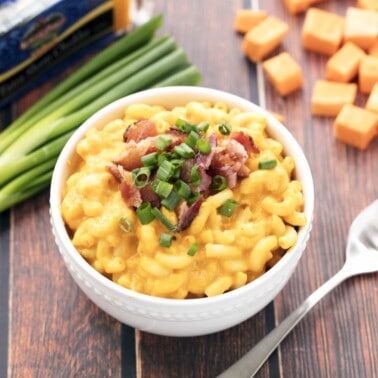 Sweet Potato Bacon Mac and Cheese will soon become your new family favorite! Sweet potatoes are the basis for this creamy sauce that's packed full of the most delicious sharp cheddar cheese.