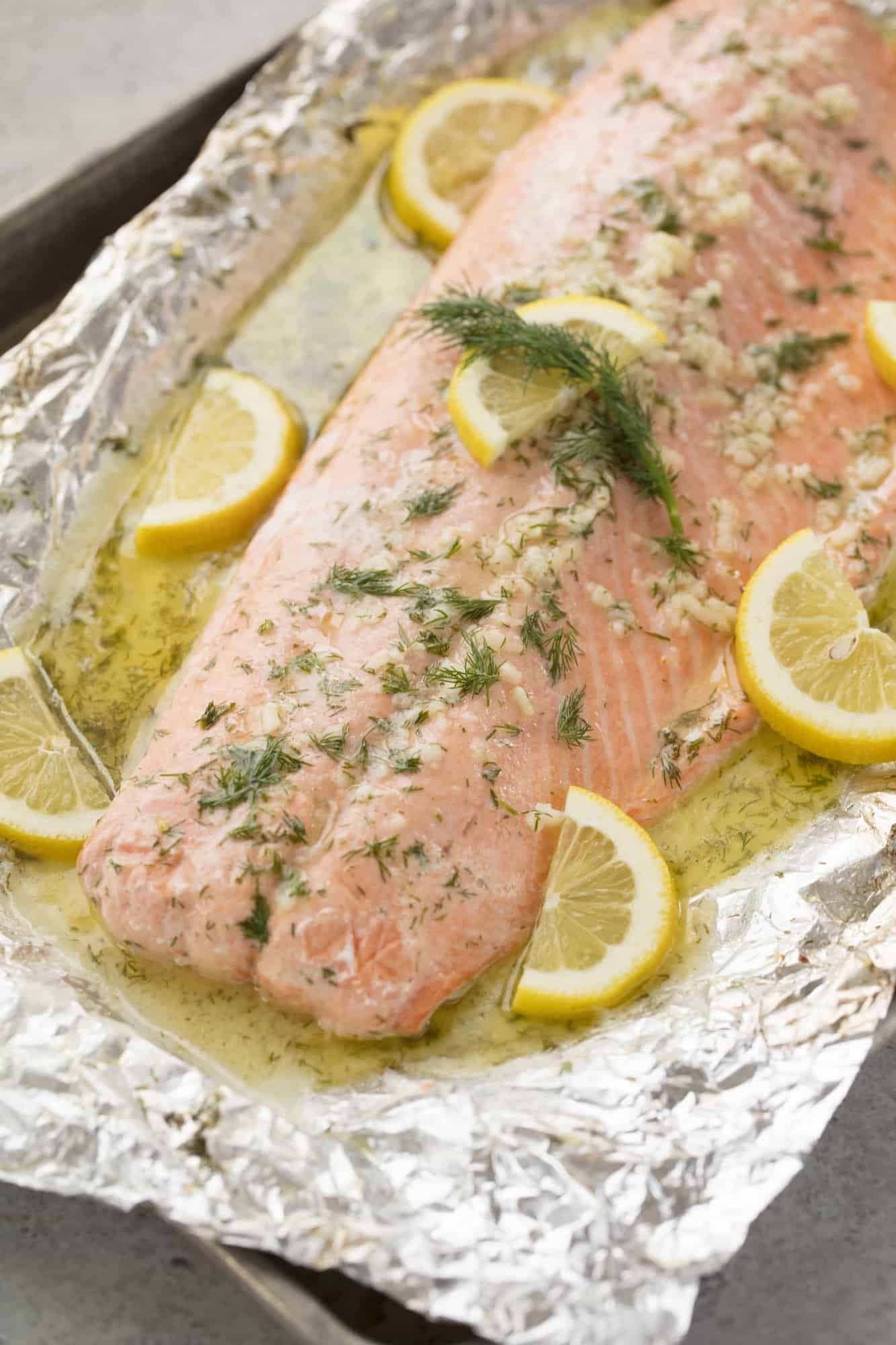 It doesn't get much easier than this Easy 5 Ingredient Baked Salmon with a garlic, lemon, and dill butter sauce. All it takes is 5 ingredients and 20 minutes of your time. So simple, so flavorful!