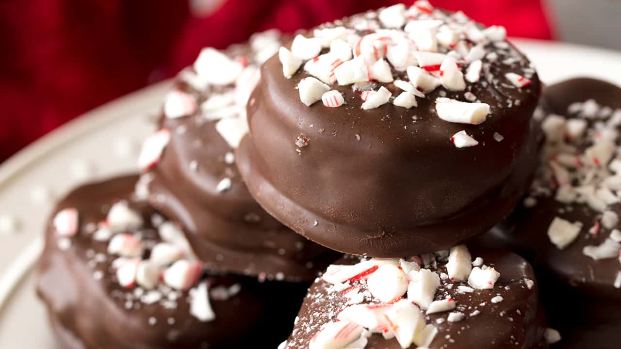 A stack of copycat Peppermint Joe Joe's topped with crushed candy cane.