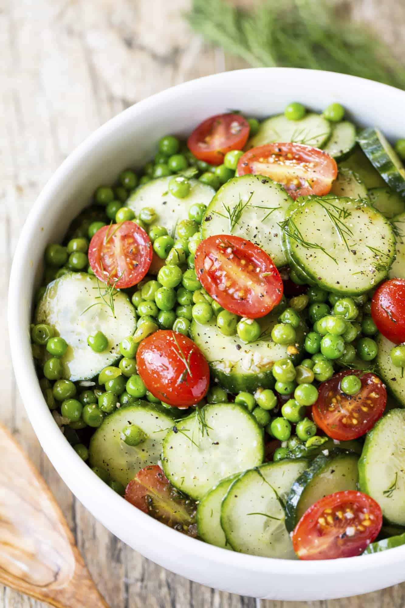 Dill Pea and Cucumber Salad in a white bowl.