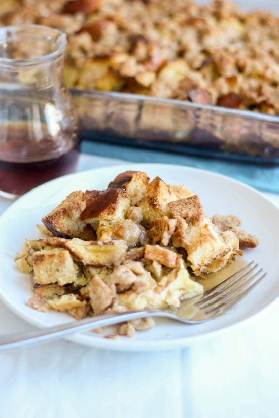 Cinnamon toast crunch breakfast casserole on a plate with a fork