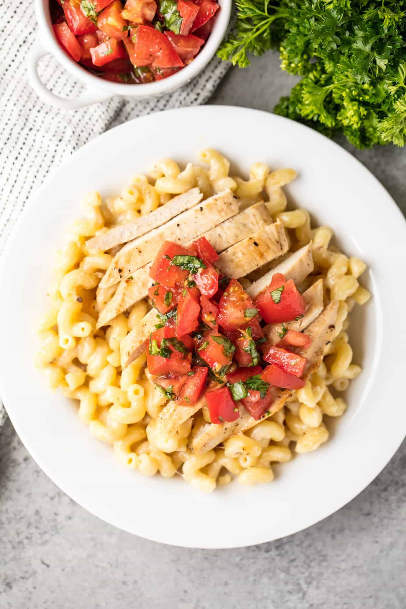 3 Cheese Chicken Cavatappi will have your family feeling like they are eating at a restaurant. Creamy, cheesy pasta topped with grilled chicken and bruschetta. It will be a family favorite!