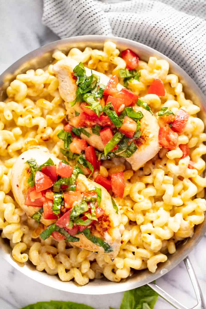 Bird's eye view of 3 Cheese Chicken Cavatappi in a stainless steel pan.