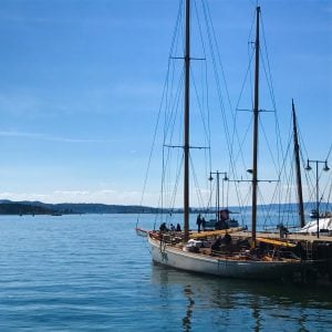 Sailboats docked in the fjord a Norway