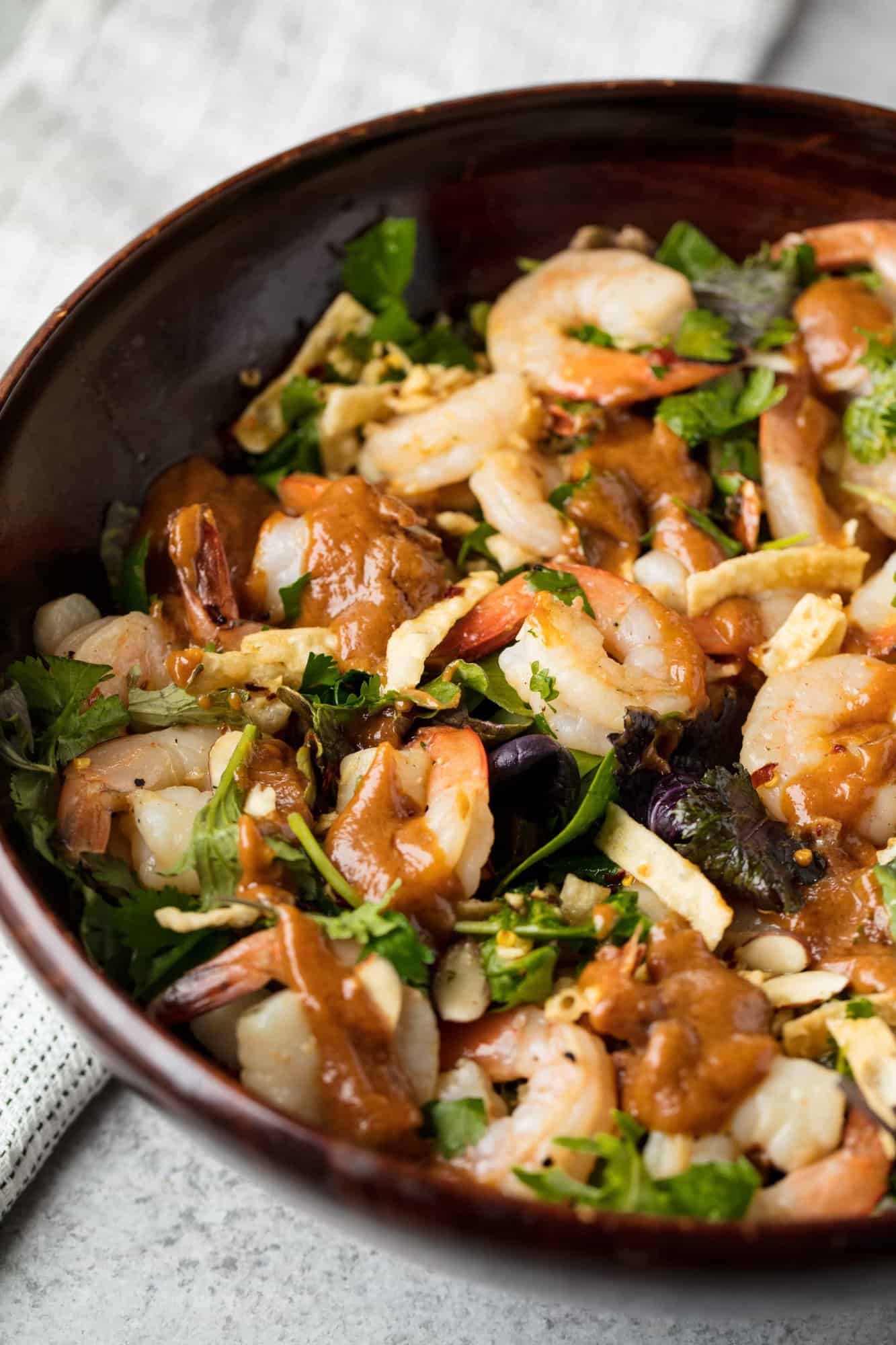 This easy Thai Shrimp Salad comes together in less than 15 minutes making it a great option for a weeknight meal. It's light, refreshing, and oh so tasty!