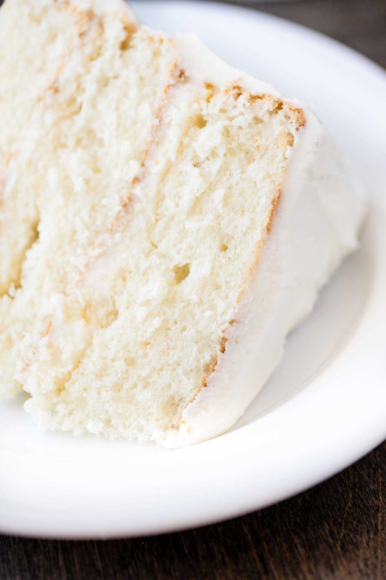 The Most Amazing White Cake is here! It's light, and airy, and absolutely gorgeous. This is the white cake you've been dreaming of!