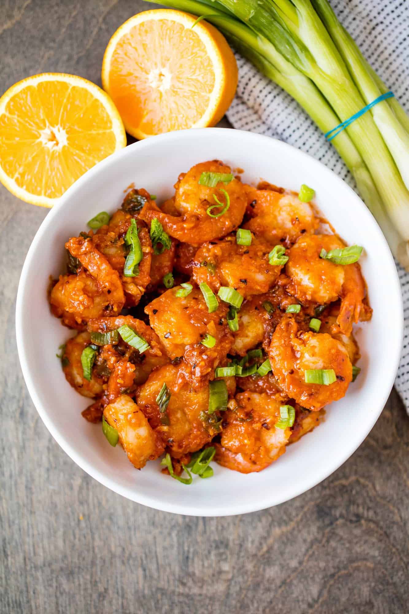 Orange Peel Shrimp is a fast and easy seafood dinner idea that will become an instant favorite. Serve this easy shrimp recipe up over some steamed rice with a side of broccoli. And that orange glaze is to die for!