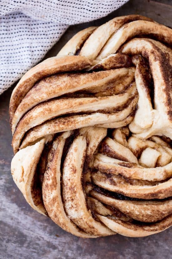 Cinnamon roll bread twisted into a beautiful wreath and baked