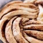 Cinnamon roll bread twisted into a beautiful wreath and baked