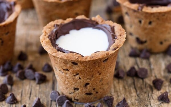 A cookie shot with milk in it