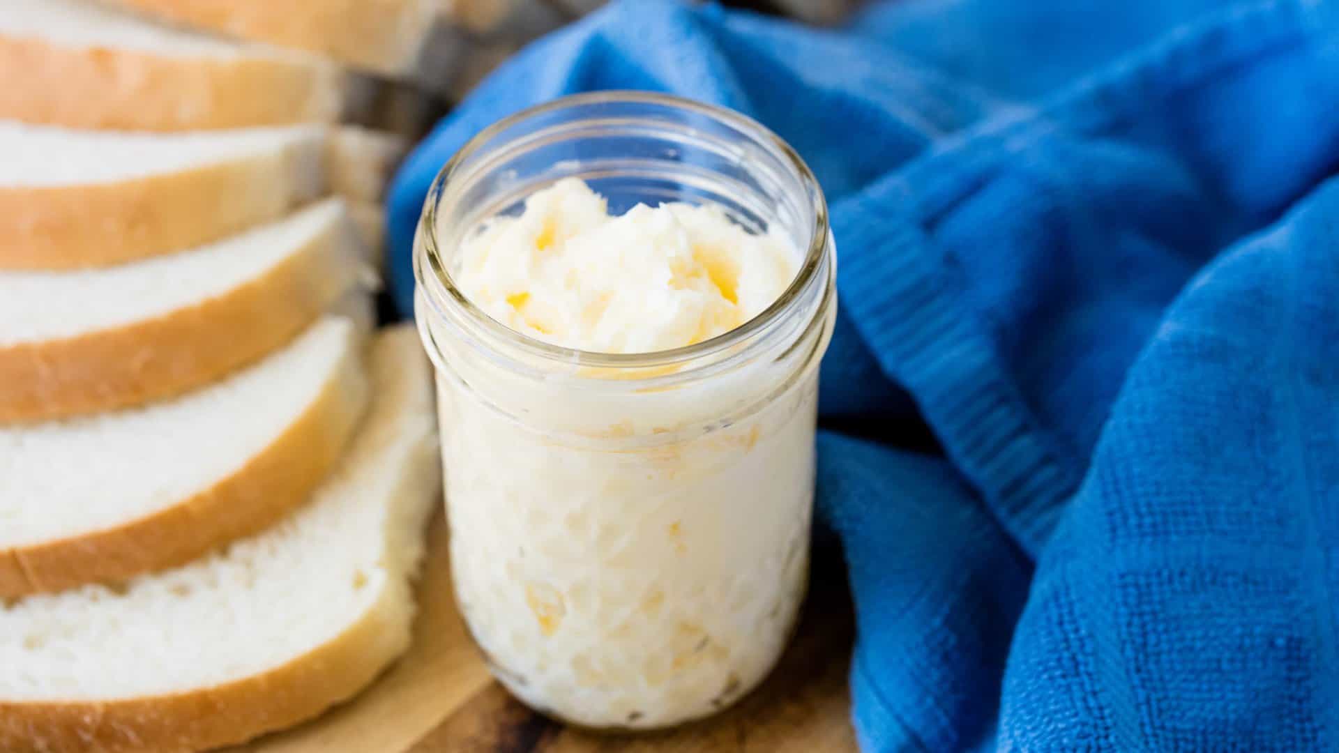 Learn how to make Homemade Butter in a Mason Jar in this fun pioneer activity for kids and adults alike! It's easy to churn your own butter and make your own buttermilk!