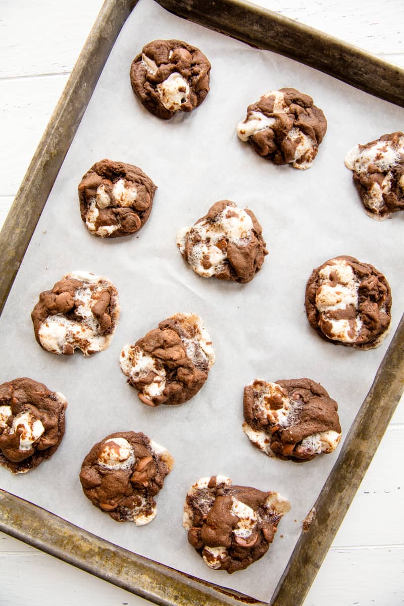 Chocolate Marshmallow Chubbies on parchment paper in a baking sheet.