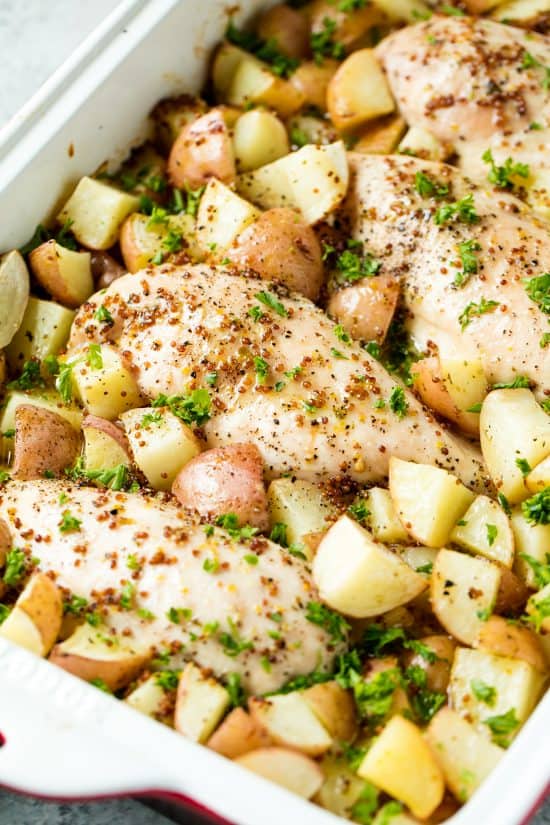 Baked Honey Dijon Chicken and Potatoes is an easy weeknight dinner that will leave you wan Baked Honey Dijon Chicken and Potatoes