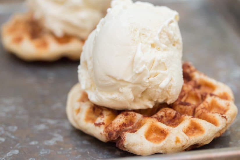 Cinnamon Roll waffle with a scoop of ice cream on it.