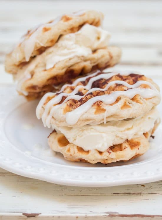 Cinnamon Roll Ice Cream Sandwiches are made in the waffle iron for a decadent Cinnamon Roll Ice Cream Sandwiches