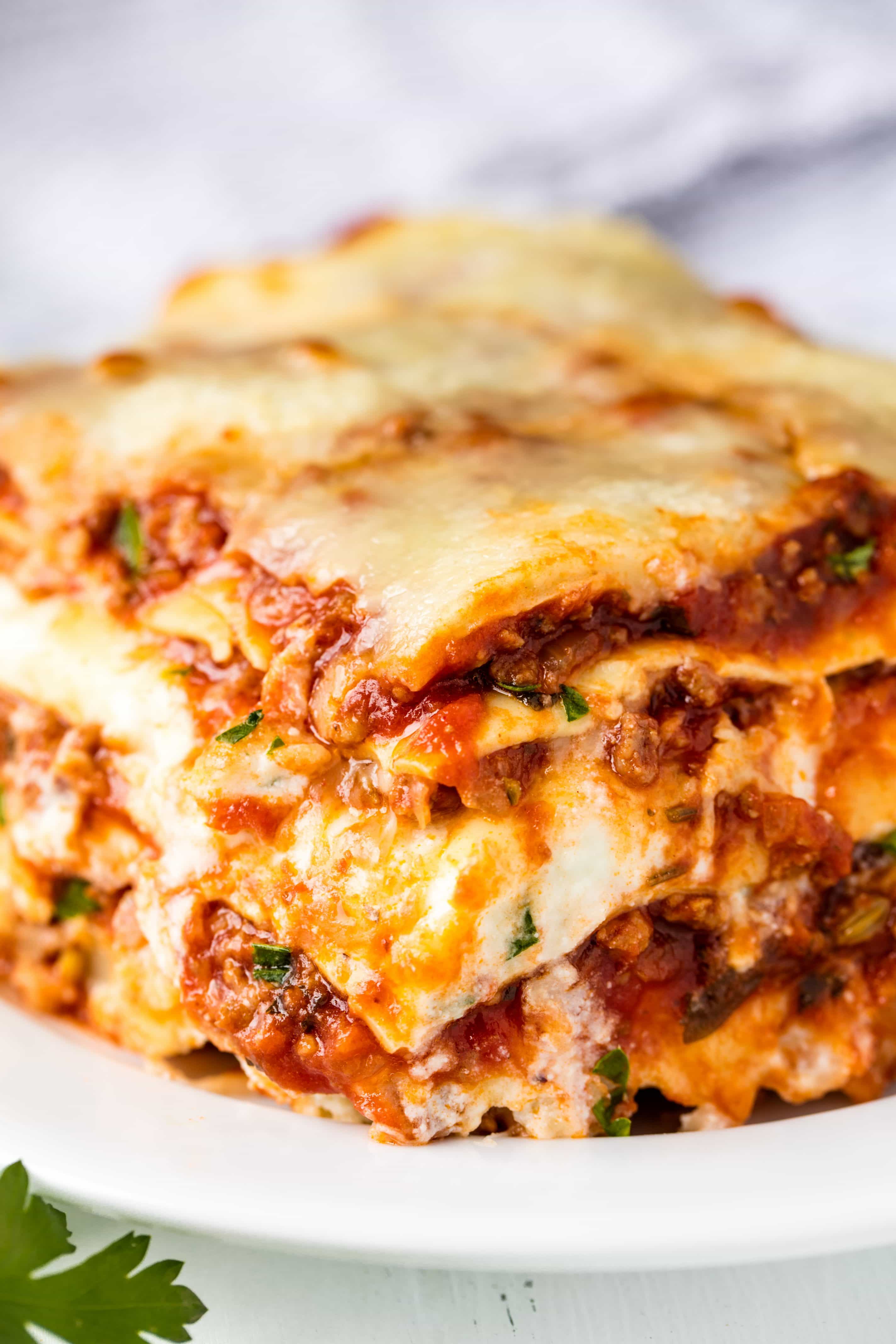 A slice of the Most Amazing Lasagna on a plate