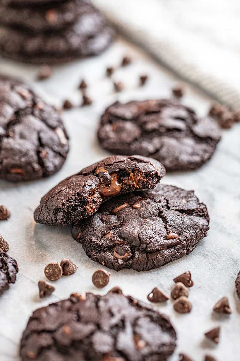 chocolate cookies with a bite out of one