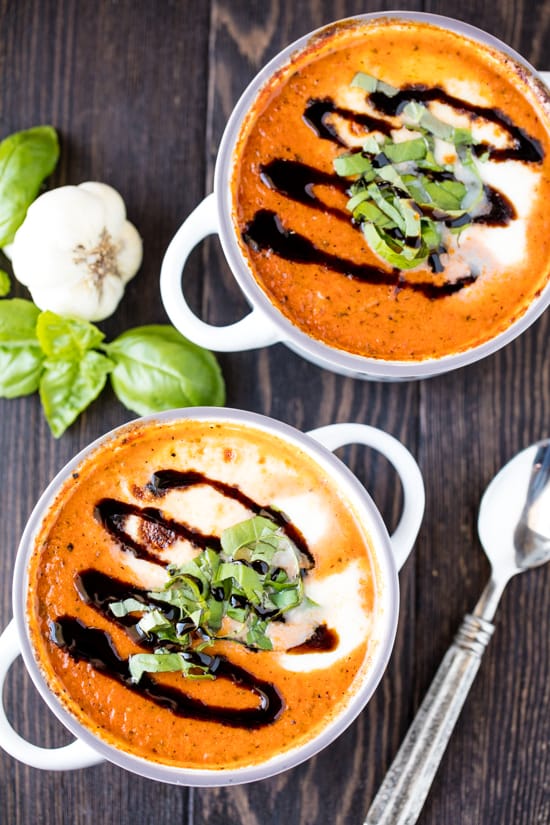 2 bowls of Caprese soup with drizzles of balsamic vinegar