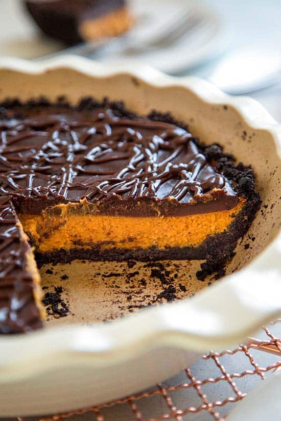 For my Creamy Chocolate Pumpkin Pie I layered a delicious glaze of chocolate ganache on top with a chocolate cookie crust for a spin on the classic pumpkin pie. keviniscooking.com