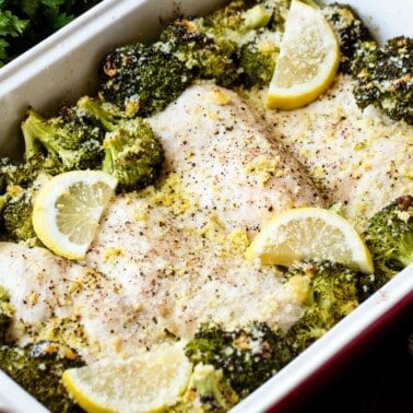 Lemon garlic chicken and broccoli bake in a baking dish.