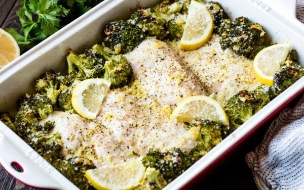 Lemon garlic chicken and broccoli bake in a baking dish.