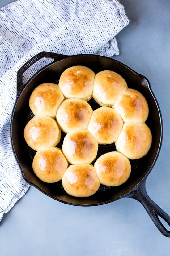Rapid Rise Skillet Rolls with golden tops, fresh out of the oven in a skillet