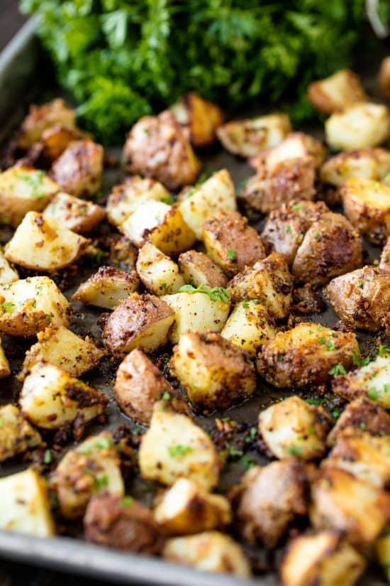 Baking sheet of Roasted Parmesan Pesto Potatoes. 