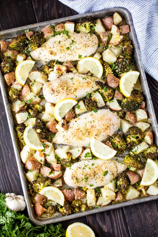 Sheet Pan Garlic Parmesan Chicken Broccoli and Potatoes is an easy weeknight dinner that's all made on one sheet pan. It's full of flavor and simple to make which makes it the perfect family dinner for busy nights. 