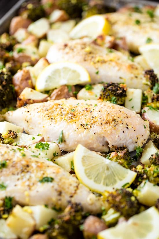 Close up of the pan sheet pan full of Garlic Parmesan Chicken, Broccoli and Potatoes. 