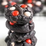 Get ready for your spooky celebration! These Dark Chocolate Halloween Cookies are a great addition to any party spread. They're soft, chewy, filled with chocolate and decorated with festive candy.