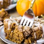 Pumpkin Crumb Cake with a fork in it on a gray plate.