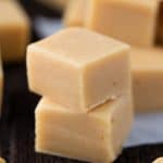 Two Peanut Butter Fudge cubes stacked onto each other.