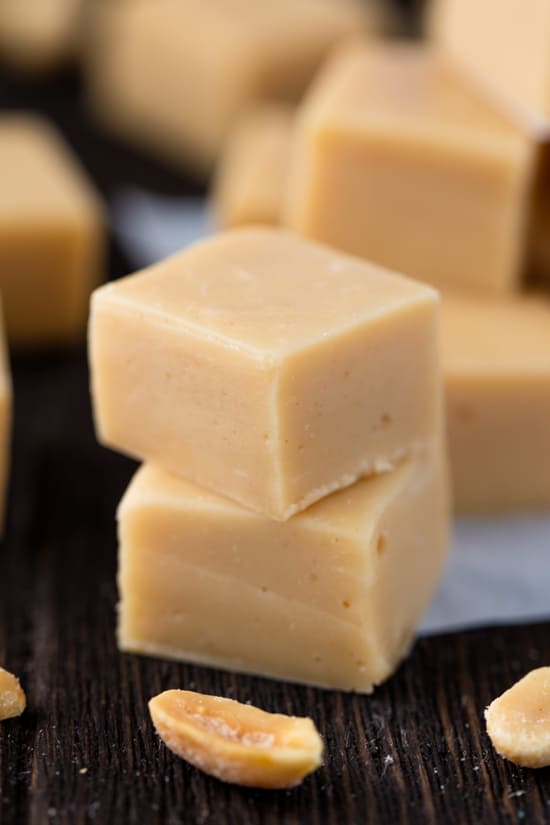 Two Peanut Butter Fudge cubes stacked onto each other.