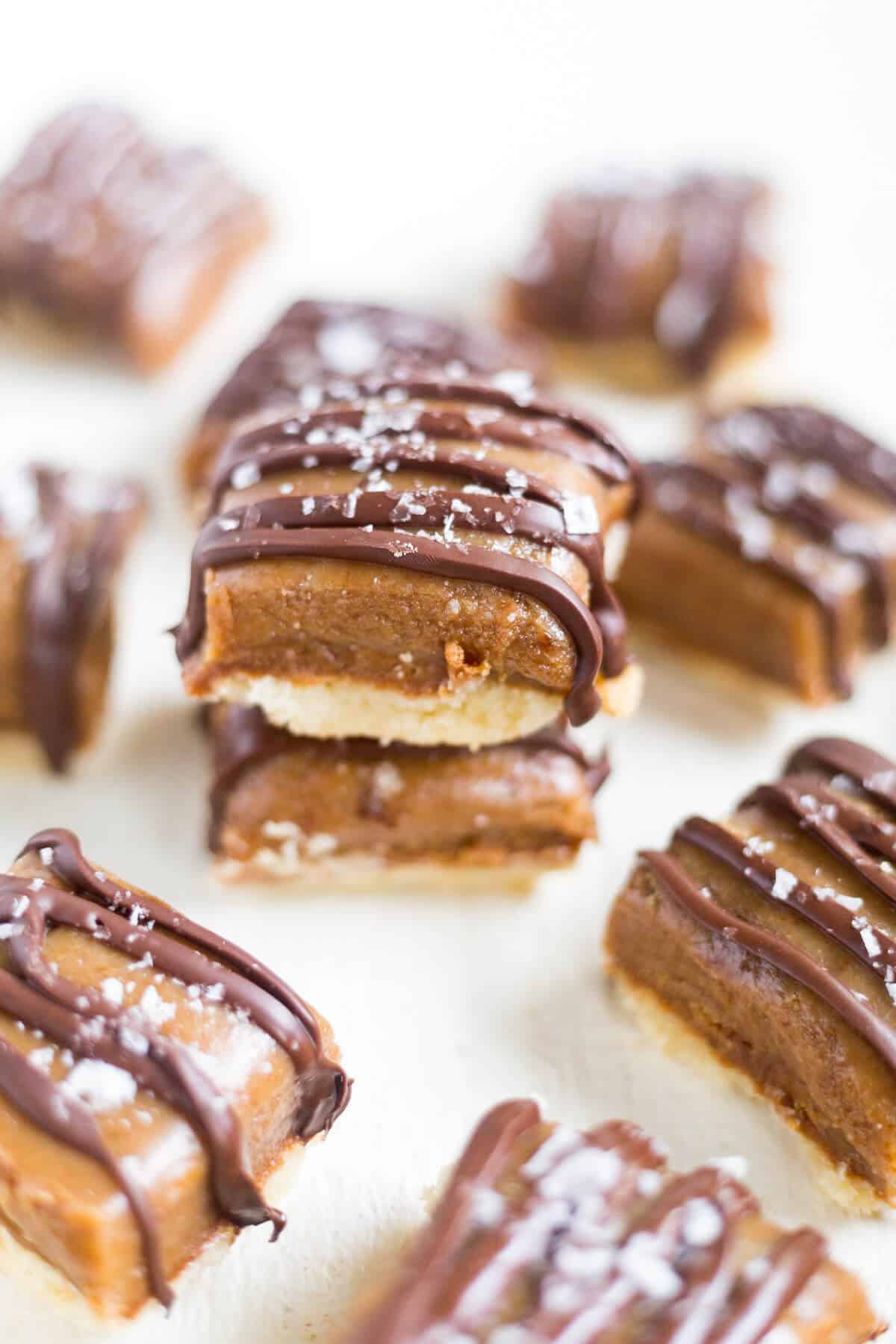 Salted caramel shortbread bars layered with shortbread, salted caramel and melted chocolate and sprinkled with sea salt