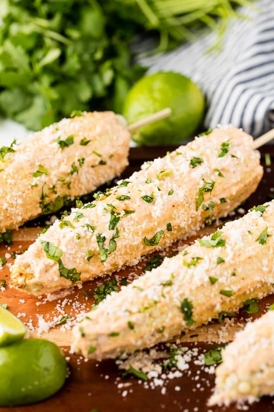 Authentic Mexican Street Corn rolled in a creamy mayonnaise/crema mixture and topped with cotija cheese and cilantro