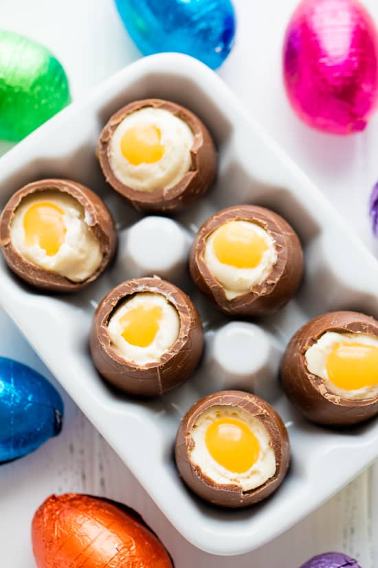 Cheesecake Filled Easter Eggs in a ceramic egg container