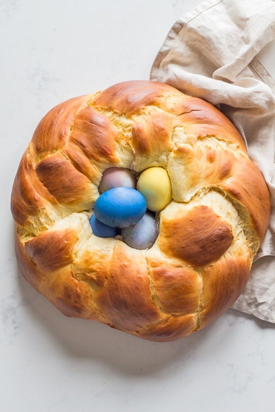 Easter Bread braided into a nest with dyed easter eggs in the center