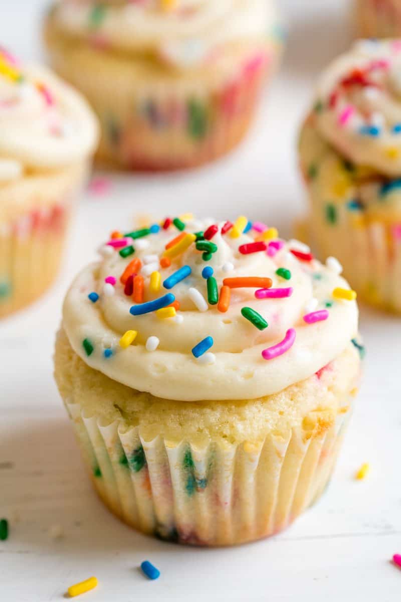 Funfetti Birthday Cupcakes on a white countertop.