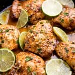 Garlic lime chicken in a cast iron skillet.