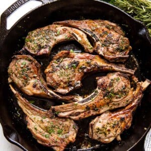 Lamb Chops in a cast-iron skillet.