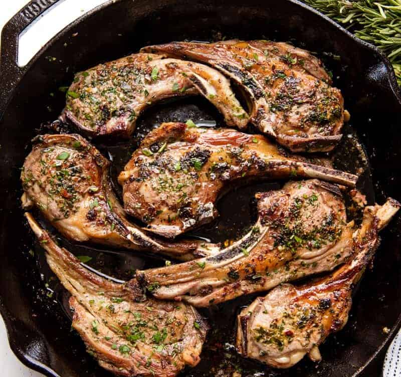 Lamb Chops in a cast-iron skillet.