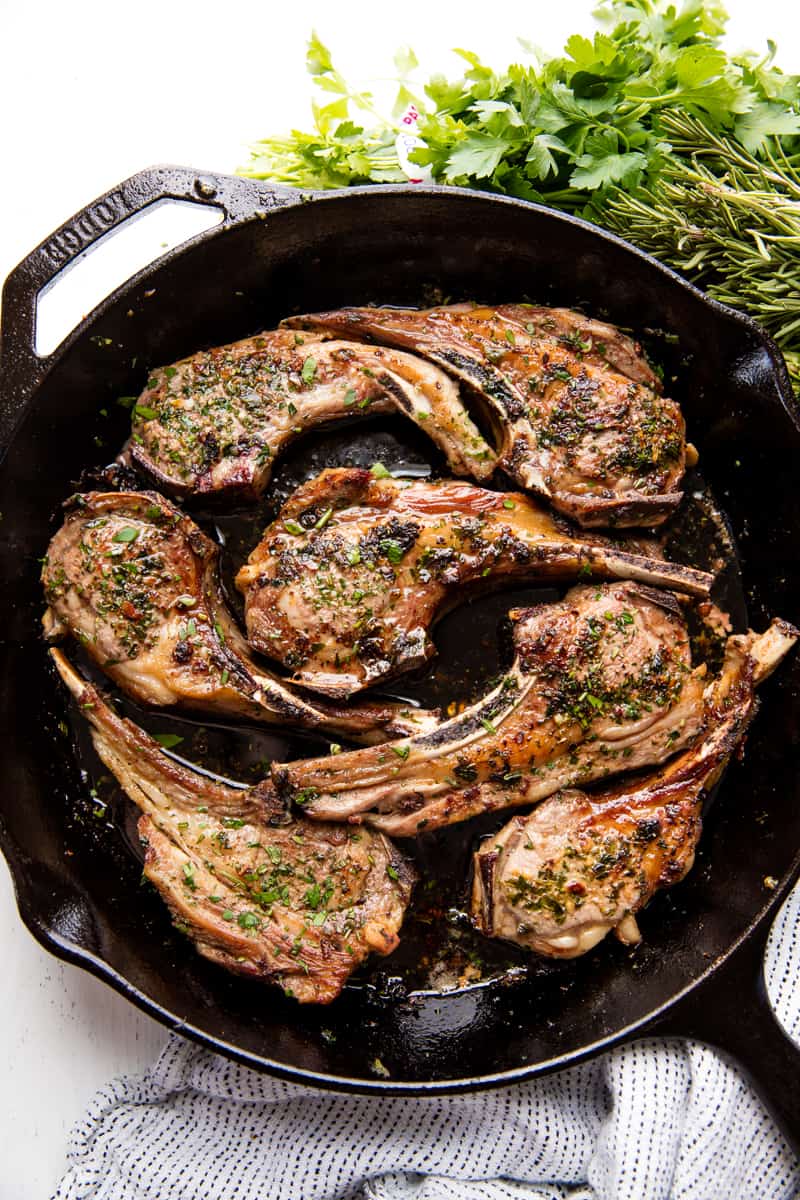 Lamb Chops in a cast-iron skillet.