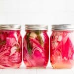 Three Mason Jars full of Pickled Red Onions